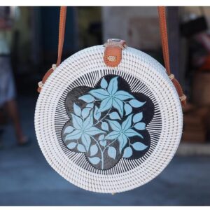 Handcrafted Bali Rattan Bags featuring Intricate Floral Artwork.