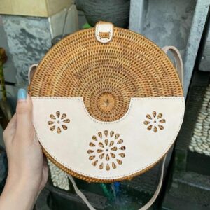 Handcrafted Round Bali Rattan Bag Featuring White Woven Rattan and Detailed Leather Accents